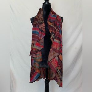 Cowgirl shawl/vest. Super cute. Goes with just about any pain shirt and jeans.